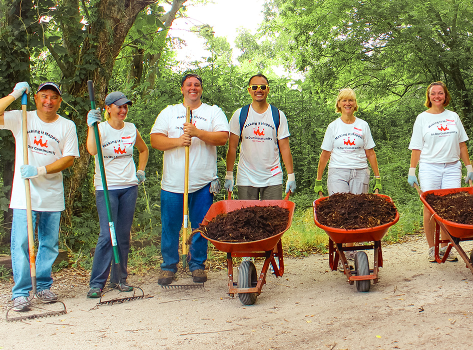 Volunteers working together on an outdoor environmental conservation project