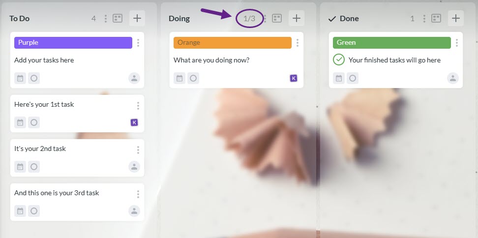 A screenshot of a Kanbanchi board showing "To Do," "Doing," and "Done" columns, with an arrow highlighting a WIP (Work In Progress) limit indicator of "1/3" above the active task column